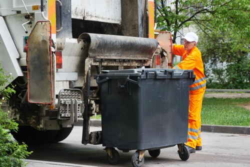 Man and van departing with garden waste from a Hackney rear garden